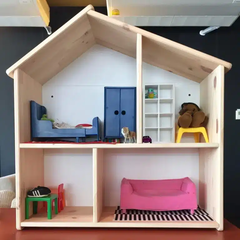 A wooden dollhouse with small furniture in its rooms. Counseling for children, teens, adults and families near Tigard, Oregon.