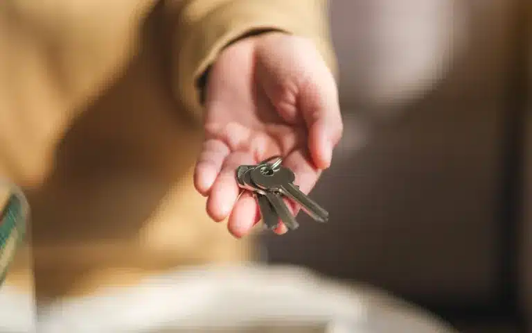 House keys resting in an open hand. Life transitions counseling near Tigard, Oregon.